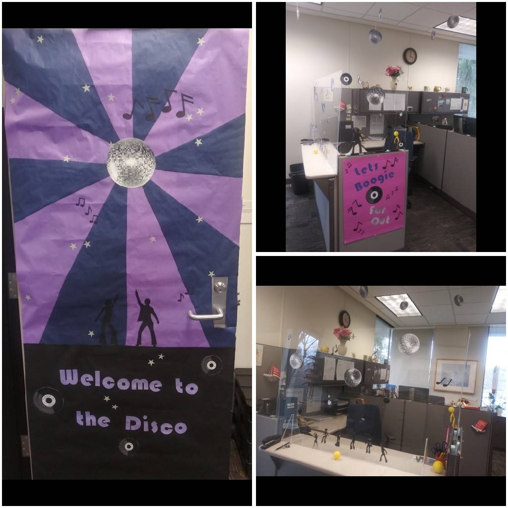 cubicle decorated with purple and black disco scene